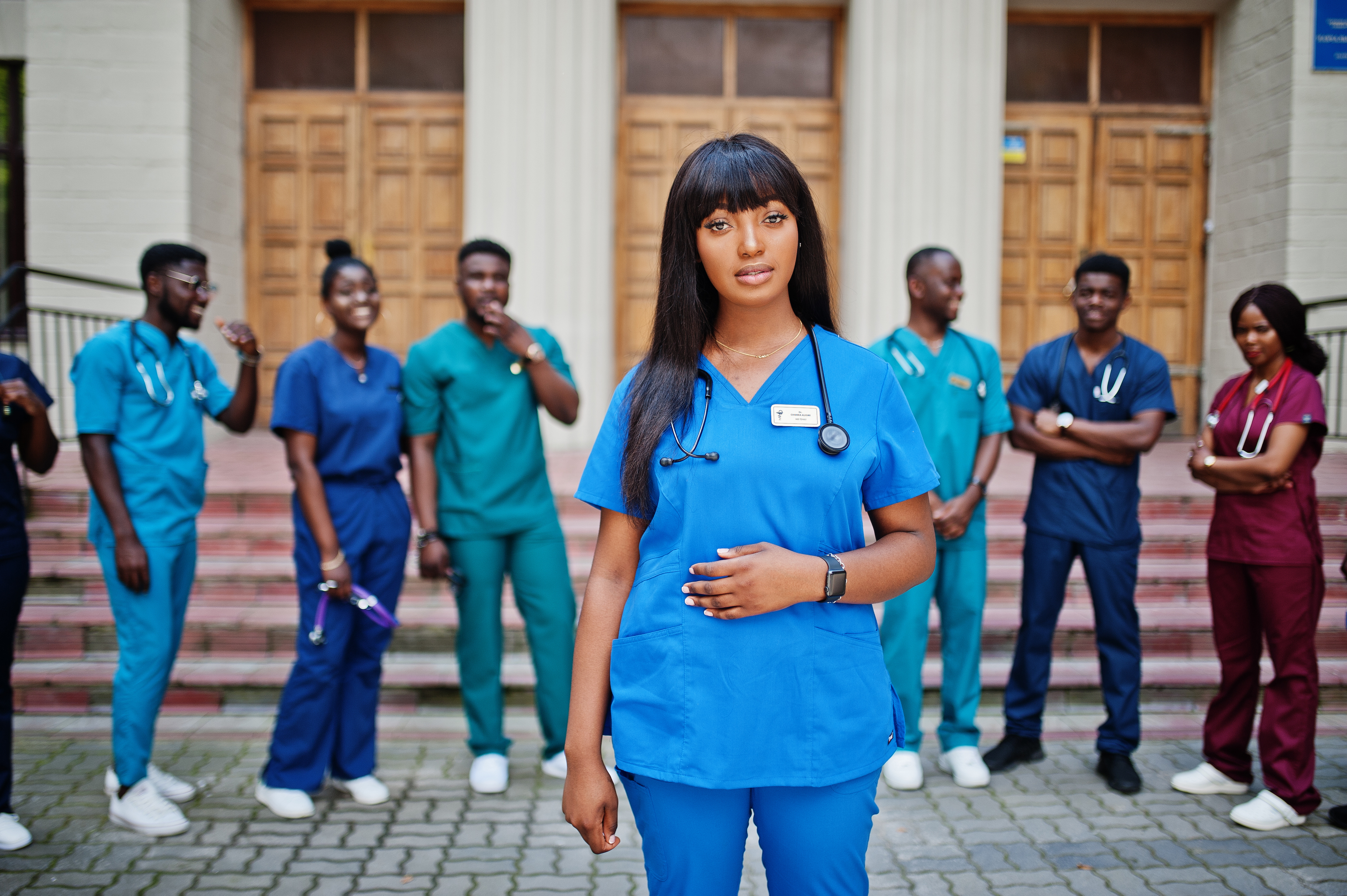 group-african-medical-students-posed-outdoor-against-university-door