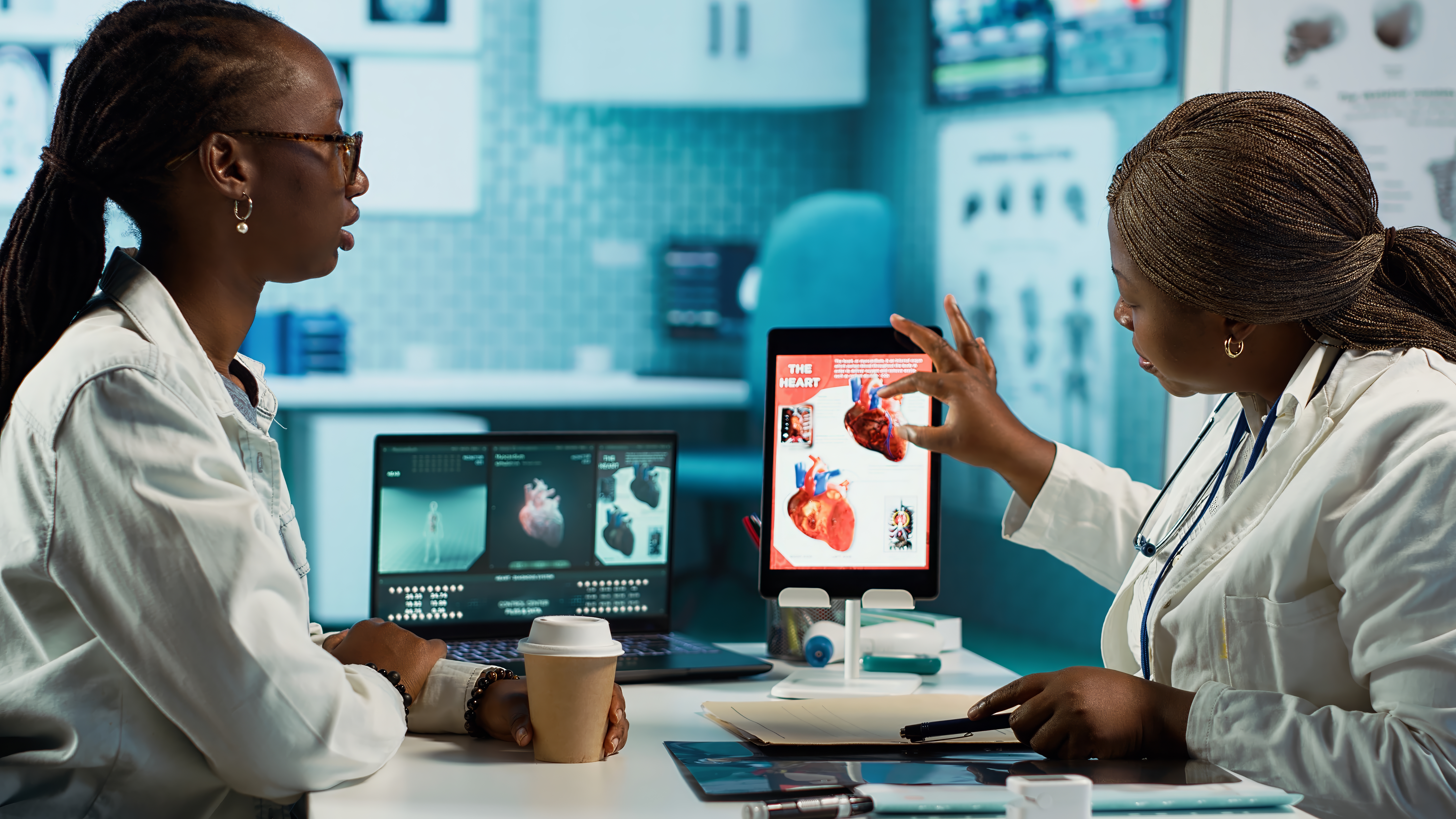 medical-office-scene-doctor-patient-evaluating-cardiology-test-results